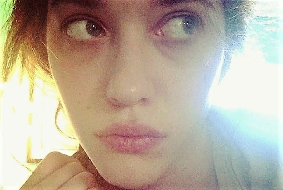 icloud leaked pic of kat dennings looking to the right and pouting her lips
